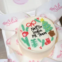 A custom Christmas bento cake we created for the Netflix India PR team. We love making personalized corporate gifts for the holidays and can add any logo or message.
