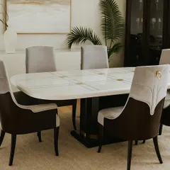 Here is a complete dining set I designed, featuring a marble-finish tabletop with brass inlays and plush, dual-tone upholstered chairs. I create these spaces to be both elegant for hosting and durable for daily family meals.