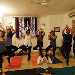 The beautiful energy of a group class at my Delhi studio. Here we are practicing Vrikshasana, the tree pose, finding balance and strength together as a community.