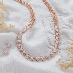 A beautiful heart-shaped diamond necklace from Orra's winter campaign. I placed it on a soft, white knit texture to create a feeling of warmth and comfort, contrasting beautifully with the sparkling diamonds.
