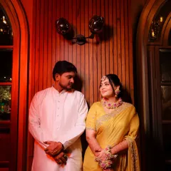 Golden vibes and haldi dreams. A beautiful couple portrait from a haldi ceremony, with the bride glowing in a yellow saree and floral jewelry.