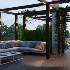 Our architectural services extend to creating serene outdoor living areas, like this rooftop terrace. We designed this space with a modern pergola, comfortable lounge seating, and integrated lighting, transforming an open roof into a private retreat for relaxation and entertainment.
