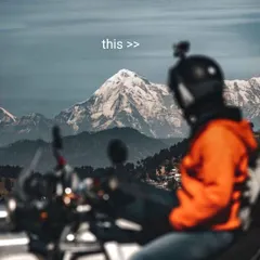 This is the view from the rider's seat on one of our Himalayan bike trips. We organize everything so you can focus on the road ahead and the stunning snow-capped peaks.