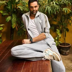 A selection of looks from my cover shoot with Abhay Deol for Travel + Leisure. The styling ranged from casual athleisure by Onitsuka Tiger to sharp pinstripe blazers, showcasing a versatile wardrobe for the modern traveler.