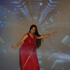 A student performing a classical dance piece, showcasing grace and skill. Our stage provides a platform for every form of artistic expression.