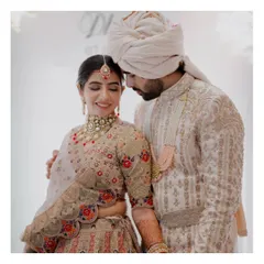 A tender and quiet moment between the couple. The soft lighting and their gentle embrace create a feeling of warmth and deep affection.