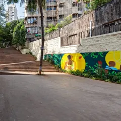 A view of the revitalized St. Stephen's Steps, with its wide, accessible ramp and vibrant murals. The design integrates art and universal accessibility, ensuring the space is welcoming to people with prams, wheelchairs, and bicycles.