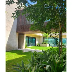 Our Dubai Hills villa, Wahatan, which is Arabic for Oasis. The design pulls the green of the golf fairway directly into its central courtyard, making nature the undeniable heart of the home.