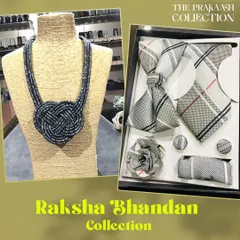 An elegant gift combination featuring a men's accessory set with a grey plaid tie and bow tie. This is matched with a sophisticated women's necklace featuring a large, woven heart knot design.