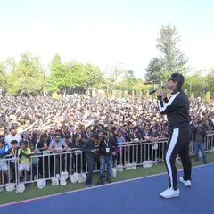 Engaging with the huge crowd of runners at the Honda marathon. My job is to get them pumped up and ready to go.