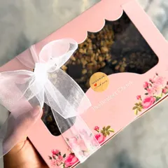 My Walnut Brownies, beautifully packaged in a floral pink box with a delicate ribbon. This makes for a perfect gift for any occasion.