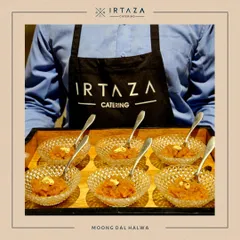 A tray of rich Moong Dal Halwa being served by my staff. This classic Indian dessert is made with ghee and nuts, and is a warm, comforting end to any meal.