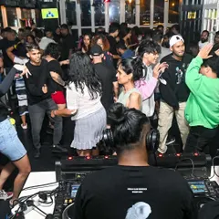 This is my office view. A packed dance floor is the only goal. I read the room and drop the beats that keep everyone moving from start to finish.