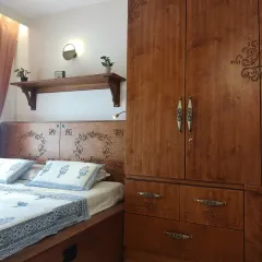 A closer look at the continuity of design in #TheSampadaHome, where the carved motif flows from the wardrobe to the custom bed frame, tying the entire room together.