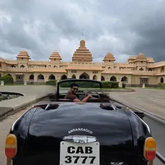 A touch of luxury during our Hampi trip. Driving a vintage Ambassador convertible at the Evolve Back resort, which is designed to reflect the region's royal history.