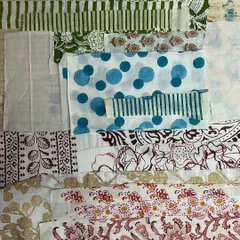 A beautiful collection of block-printed fabric swatches curated by our client Susan. The mix of florals, geometrics, and stripes in vibrant colors perfectly complements a sunny day at our studio.