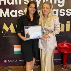 Certified and ready to create magic! Posing with Kristina Fedorova after completing her hairstyling masterclass. This is a testament to my commitment to excellence.