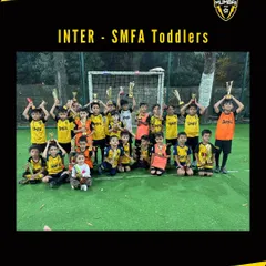 Our entire group of toddlers celebrating with their trophies after the Inter-SMFA tournament. We make sure every child feels like a champion.