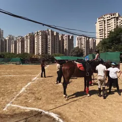 Our large, open grounds provide a unique setting for daytime events, with horses and stables nearby. This shot from a corporate decathlon shows the scale of our space with the city high-rises in the background.