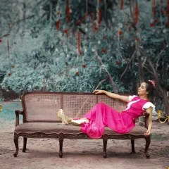 Embracing a fearless indie-chic vibe with this fuchsia pleated maxi dress. It's a perfect example of how I blend modern silhouettes with traditional Indian inspiration for a truly unique cocktail or event look.