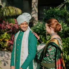 This was such a special moment, blending two cultures in one beautiful look. For her Marathi wedding ceremony, Rach, my lovely bride with Irish roots, embraced tradition in a stunning pure gold Paithani Nauvari saree. We even incorporated a Celtic knot design from her grandmother's scarf into her blouse, a small touch to honor her heritage.