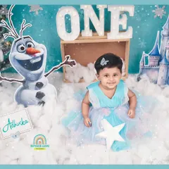 A sweet portrait of the birthday girl, Adhvika, during her 'Frozen' themed first birthday shoot.