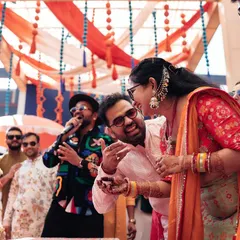 Sharing a laugh with guests during a Haldi ceremony. These candid, happy moments are what make an event special. My job is to create the space for them to happen.