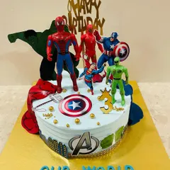Avengers, assemble for a heroic birthday! This action-packed cake features favorite superheroes like Spider-Man, Captain America, and the Hulk, ready for an epic celebration.
