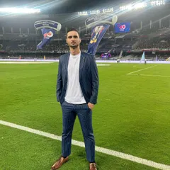 Styling for on-air personalities like footballer Karan Sawhney for the Indian Super League requires a blend of sharp tailoring and modern style. This pinstripe suit offers a polished yet contemporary look perfect for television.