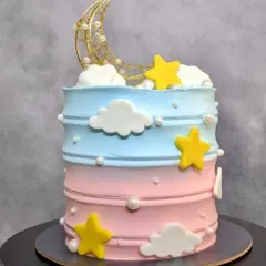 The 'Twinkle, Twinkle' cake before the lights are turned on, showing the cute pink and blue ombre design.