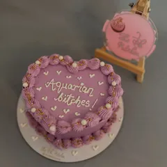 I love creating cakes with a bit of personality. This cheeky heart-shaped bento cake was made for an Aquarian's birthday celebration, showing how you can get really specific with your custom messages.