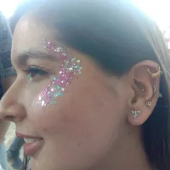 Sometimes, all you need is glitter. This is my signature chunky glitter application, perfect for creating a bold festival or party look. I mix different sizes and colors of glitter to create a custom, high-impact effect that looks amazing in photos.