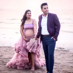 Walking hand-in-hand along the shore, looking towards the future. The flowing gown adds a beautiful sense of movement and drama.