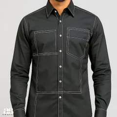A close-up of the torso, focusing on the geometric stitching and the dual chest pockets. The precision of the lines gives the shirt a clean, architectural feel.
