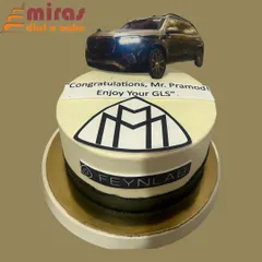 To celebrate a major purchase, I created this cake featuring the Feynlab and Maybach logos, topped with an edible model of the new GLS. It's the perfect way to mark a significant achievement or company milestone.