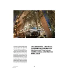 A quote from the Domus India feature, describing the experience of being within the studio's multi-level, transparent structure as a "sense of exhilaration." The article captures the feeling of lightness and suspension that the design aims to evoke.