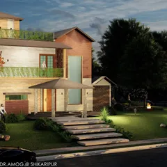 Our landscape design for this Shikaripura villa features a sprawling lawn, natural boulders, and stone steps that create an organic flow. The garden is not just an addition but a fundamental part of the home's living experience.