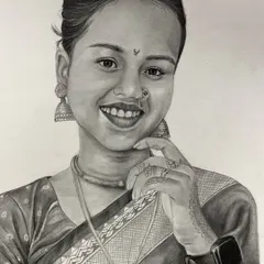 A finished pencil sketch of a smiling woman in a sari. I took care to render the details of her traditional attire, including the intricate henna on her hand.