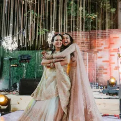 "I like me better when I’m with you." This beautiful, candid hug between the bride and her mother after their heartfelt mother-daughter performance says it all.