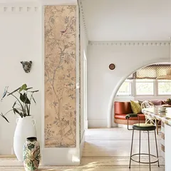 In this design, a delicate, nature-inspired wallpaper panel adds a touch of elegance and artistry to a hallway. The soft hues and graceful bird-and-branch motifs whisper quiet sophistication.