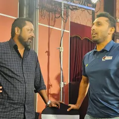 In conversation with a fellow coach at the event. Discussing the finer points of the game and coaching methodologies is always insightful.