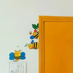 Art doesn't have to be huge to make an impact. I love adding small, playful doodles like these cute bees around light switches and door frames to bring a little bit of unexpected joy to a room.