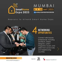 An exhibitor and attendee exchange business cards, a classic and essential part of the networking experience that fosters future collaborations.