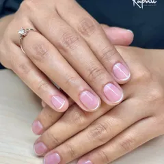 Even I need a simple manicure sometimes! Here's a classic French gel polish on my own natural nails. It's timeless and elegant.