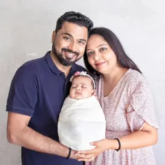 A perfect first family portrait. Capturing the three of you together with your peacefully sleeping newborn is a memory you will cherish forever.