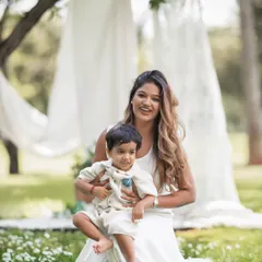 A lovely mother and son portrait from a family picnic session. The all-white wardrobe and natural green background create such a fresh and timeless look.