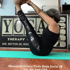 Another demonstration of the classic boat pose, a key posture for building a strong and stable core.
