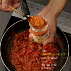 The second and most crucial addition of Pav Bhaji Masala happens when the bhaji gravy is being prepared. This is when the real magic happens, as the blend of spices blooms in the heat, creating that authentic Mumbai taste.