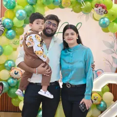 A family portrait with the birthday boy at his jungle-themed second birthday party.