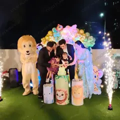 The cake cutting ceremony is the heart of the party, and I love making it extra special. This rooftop celebration features a custom jungle-themed cake, a friendly lion mascot for the kids, and dazzling cold pyro sparklers to light up the night.